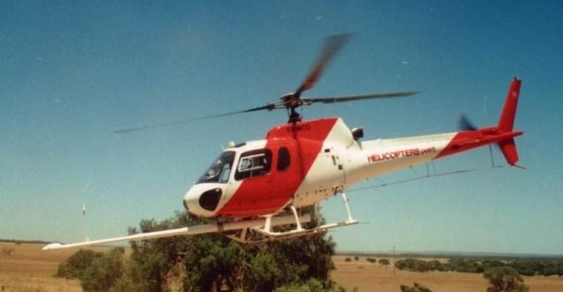 helicopter holding the part of the machine