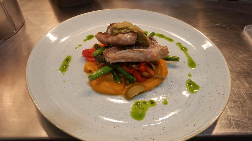 A Plate of Food with Meat and Vegetables on A Table — Every Occasion Catering in Manilla, NSW