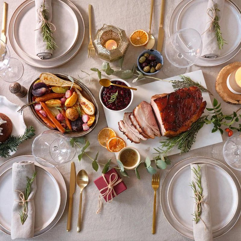 A Table Topped with Plates, Utensils, and A Variety of Food — Every Occasion Catering in Currabubula, NSW