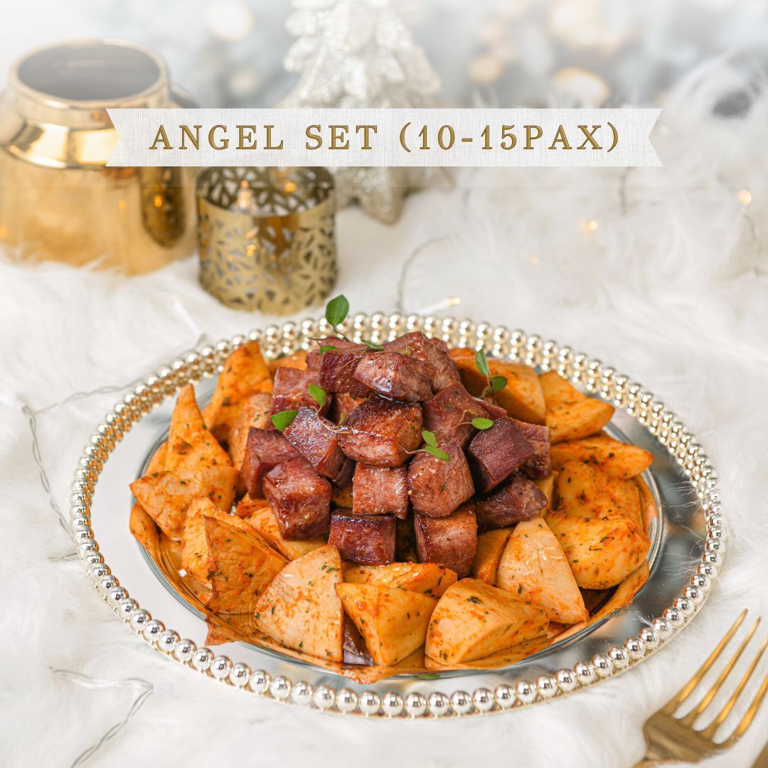 Silver platter with cooked meat and potatoes, a holiday meal. Text reads