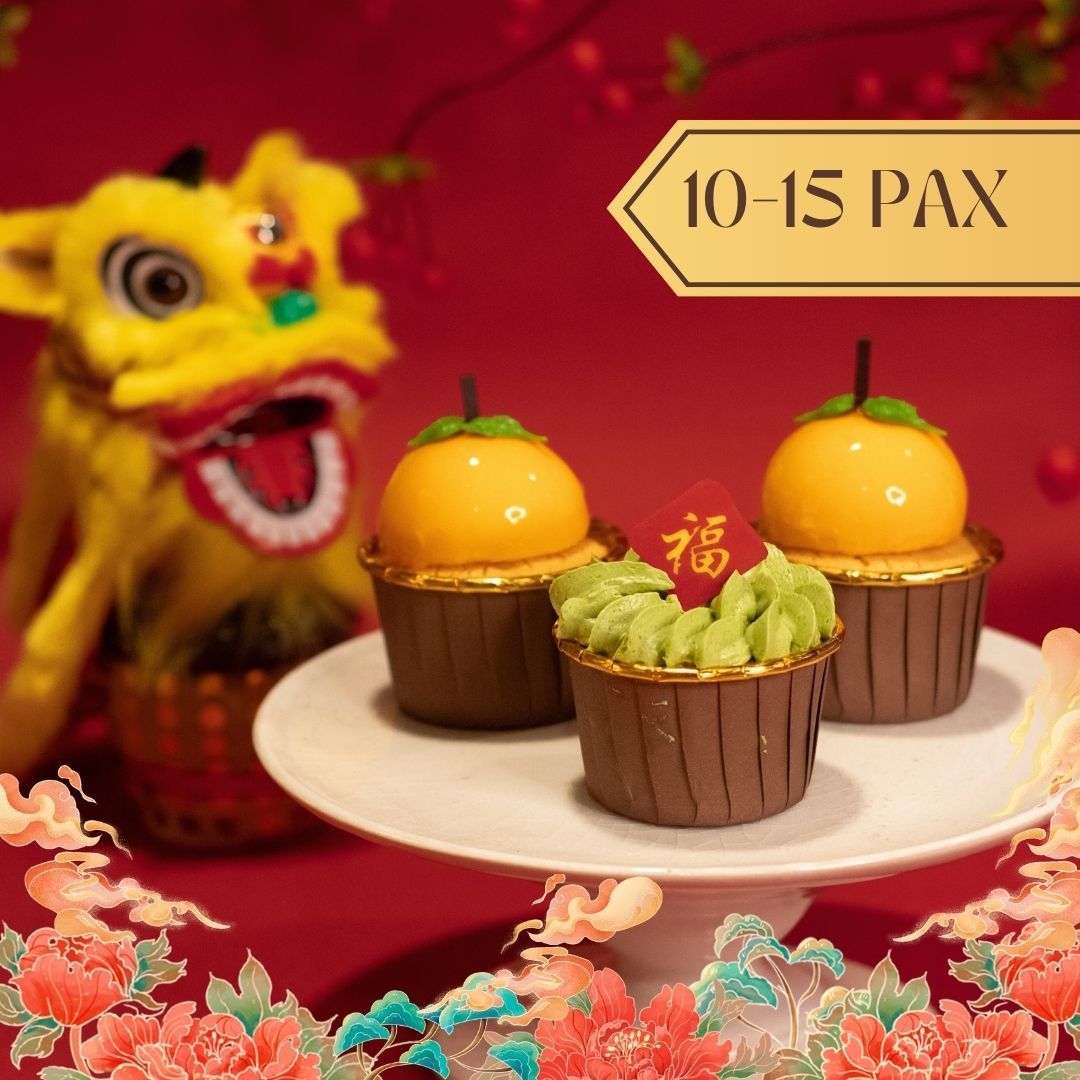 Chinese New Year cupcakes with a lion dance figure on red background.