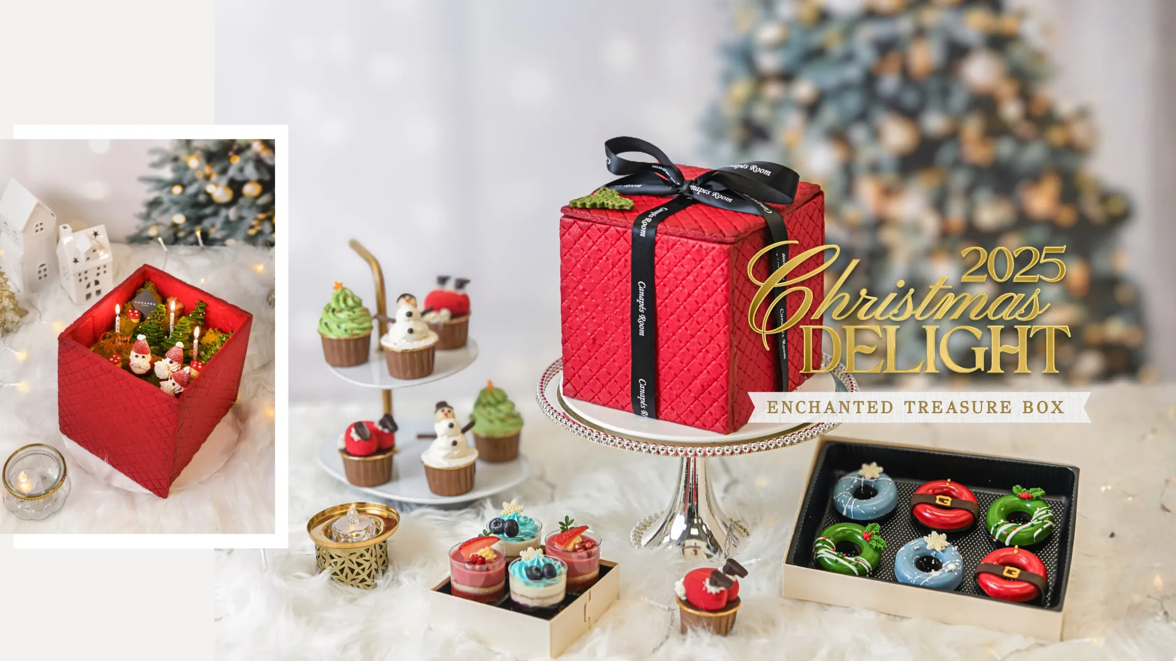 Christmas sweets display: gift box cake, cupcakes, donuts, candles, and decorations in a festive setting.
