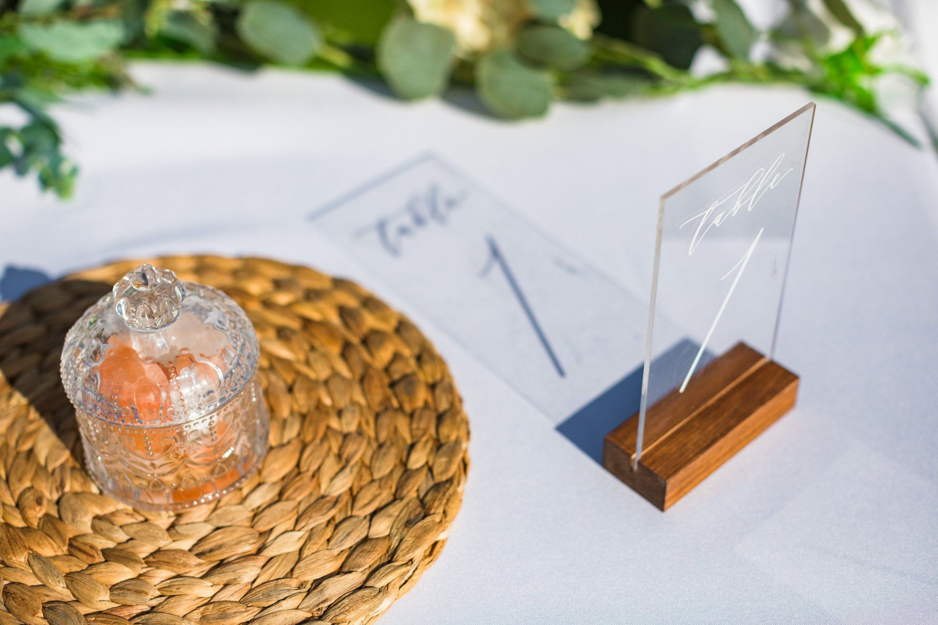 Wedding table setting with clear acrylic table number 