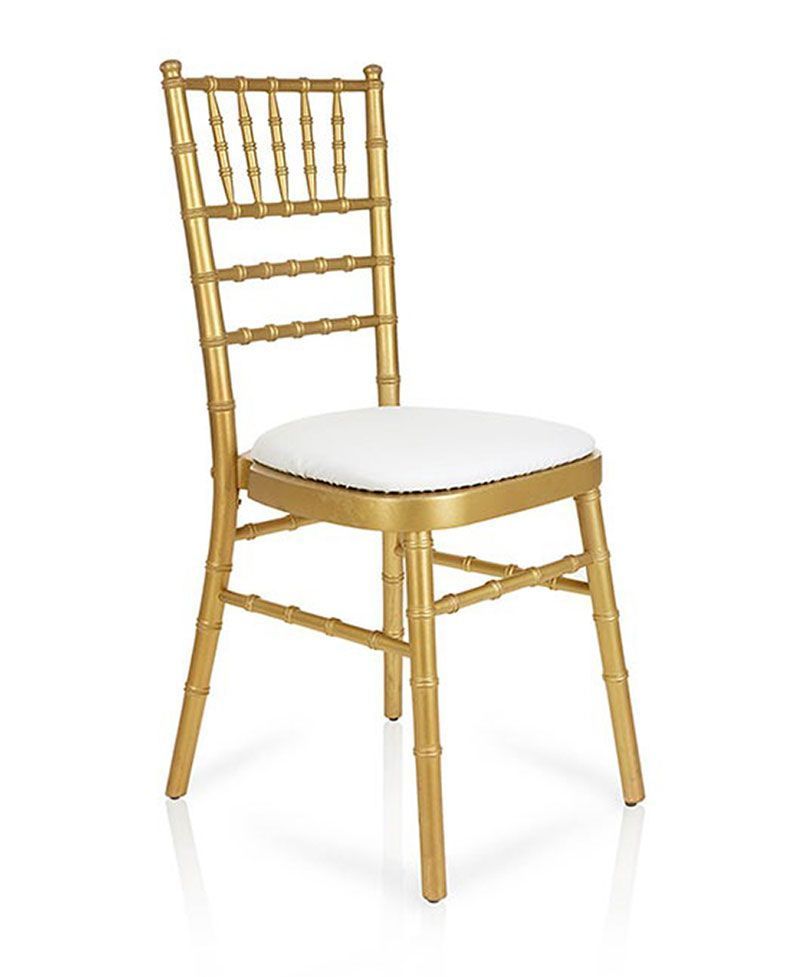 Gold Chiavari chair with white cushion.