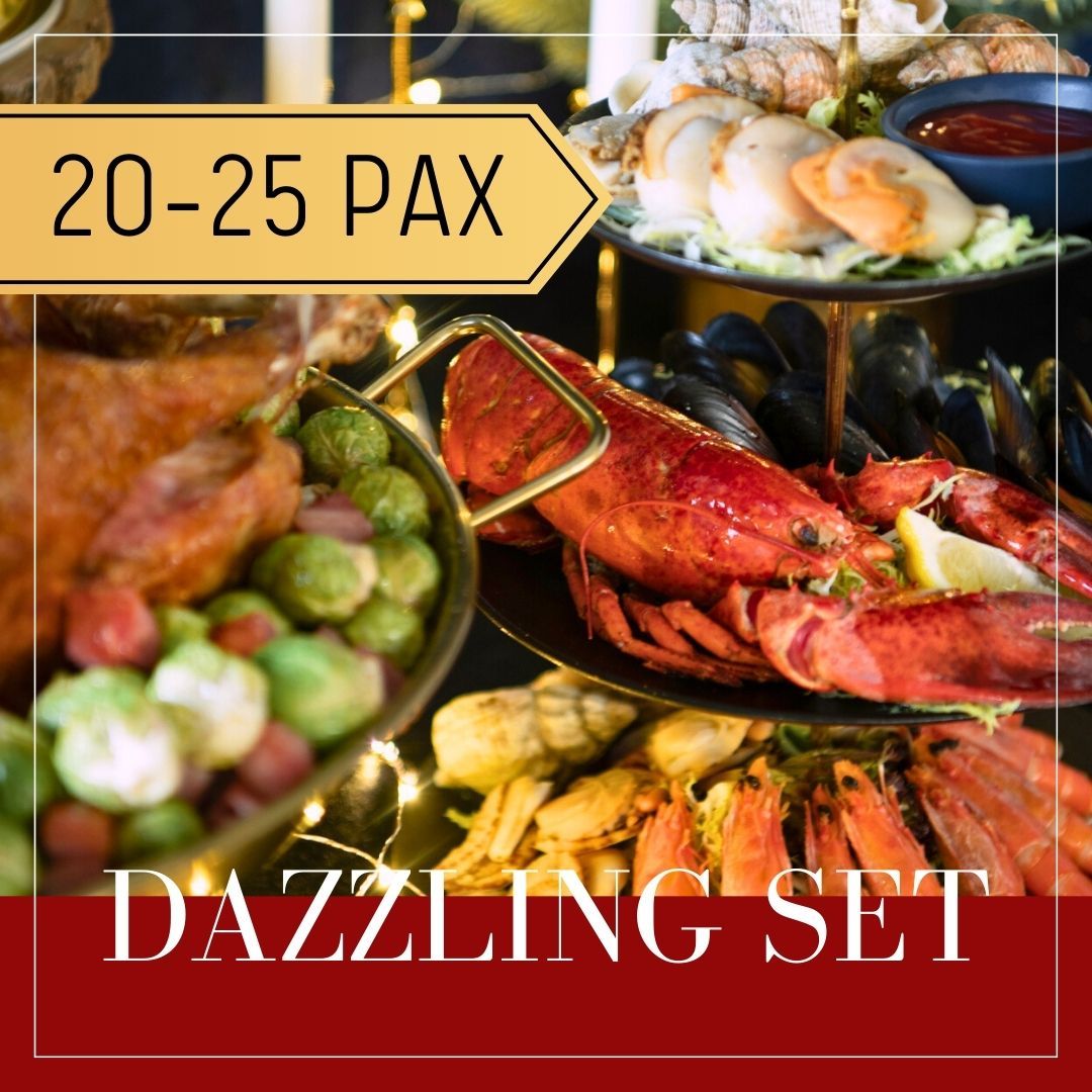 Dazzling food set for 20-25 people. Lobster, mussels, scallops, and other dishes are on display.