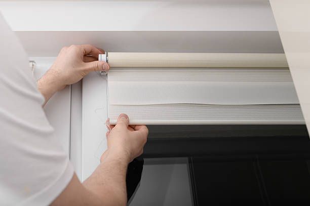 Dark green horizontal Venetian blind slats for textured background and interior design.