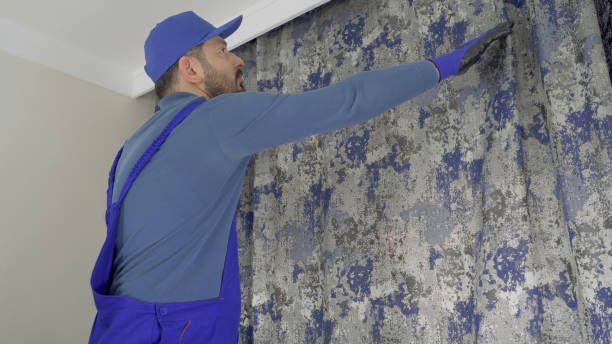 Texture of closed white aluminum Venetian blinds for privacy and light blocking.