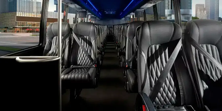 38-passenger executive bus interior with comfortable leather group seating