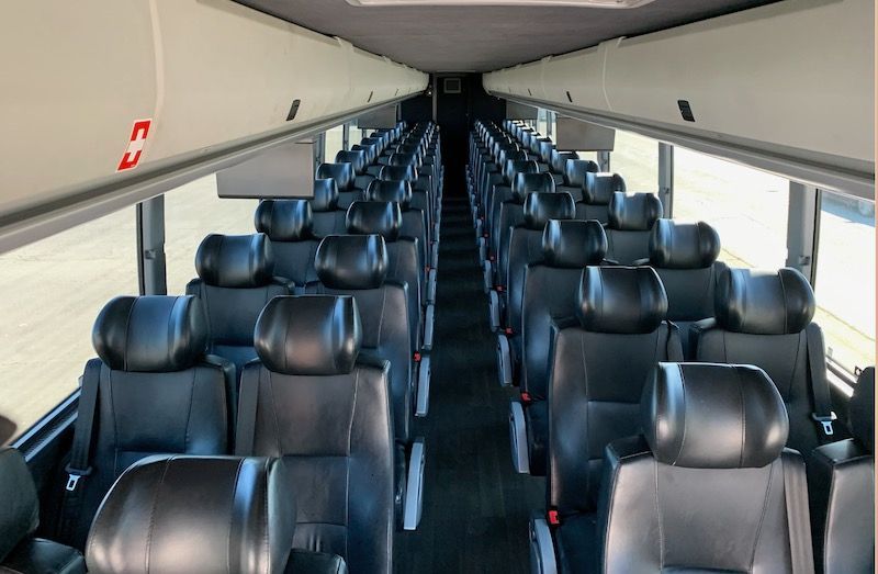 56-passenger executive coach bus interior with leather group seating