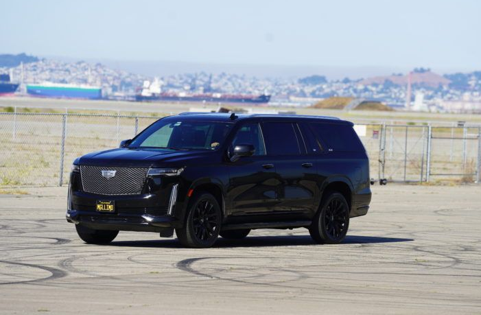 Black Cadillac Escalade ESV for executive airport transportation