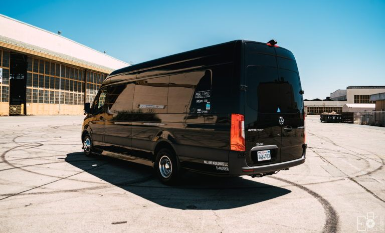 Black Mercedes Sprinter van exterior for group transportation