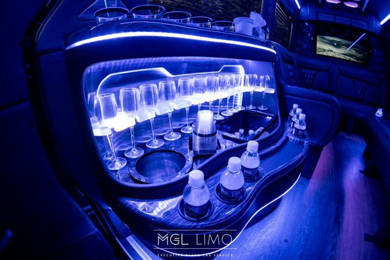 Limo Sprinter rear bar with glassware and blue lighting