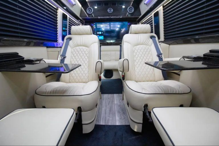 White leather Jet Sprinter interior with premium captain chairs