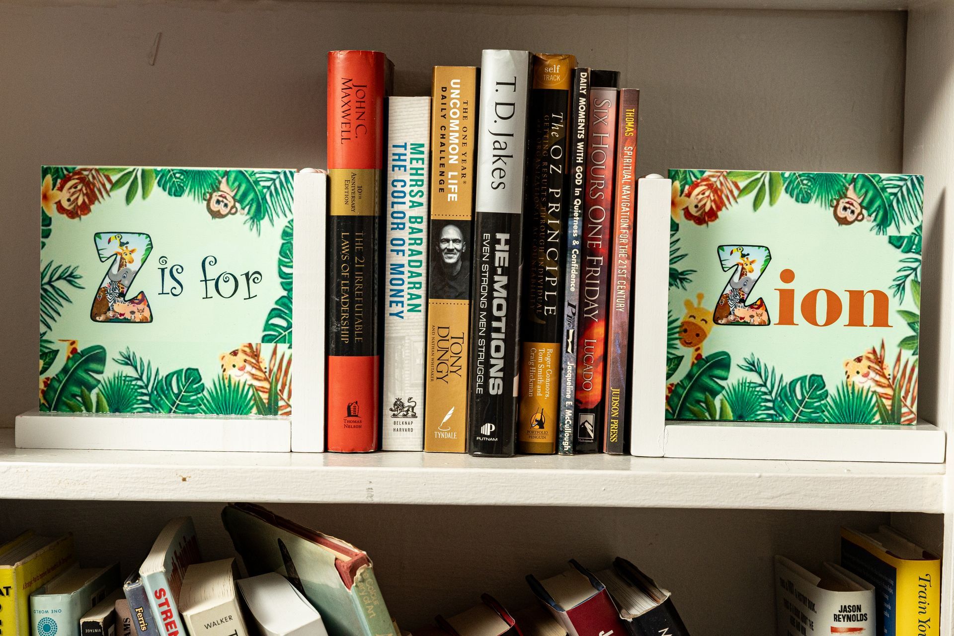 A bookshelf with a book titled z is for zion