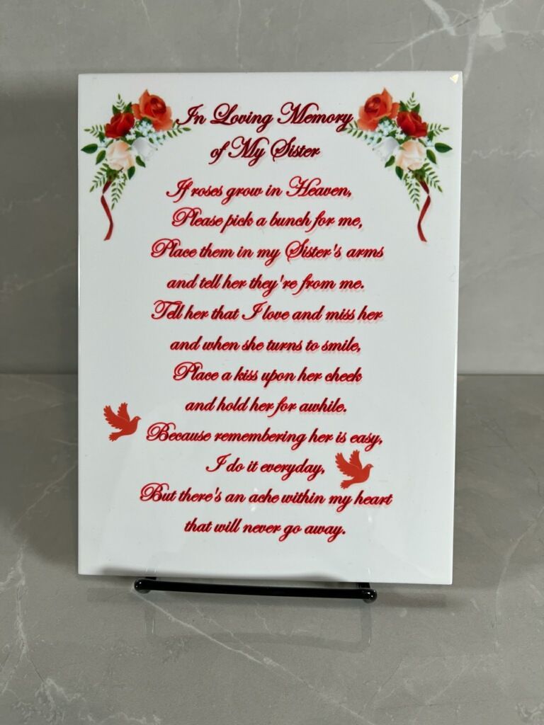 A plaque that says in loving memory of my sister