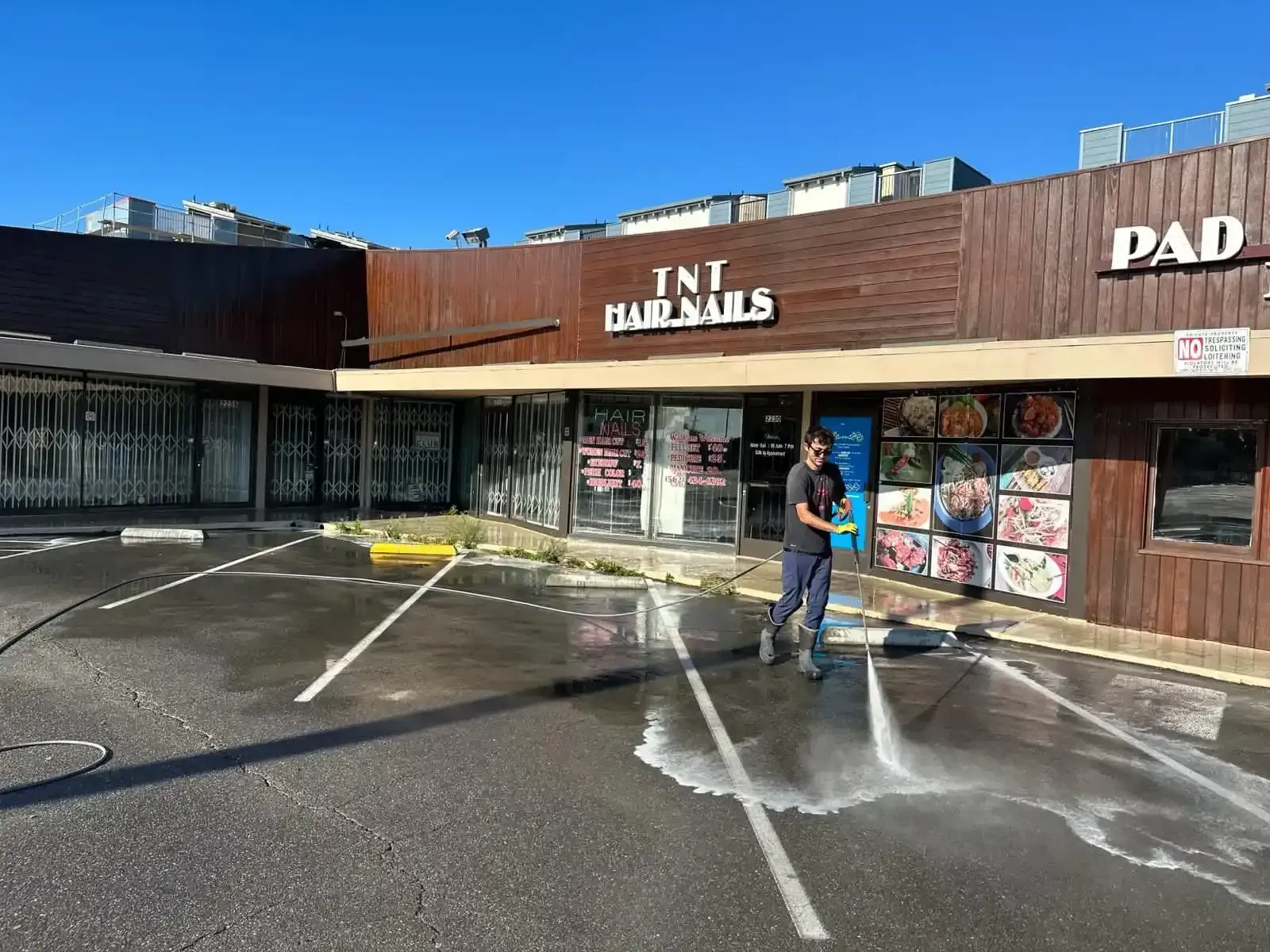 Parking lot pressure washing
