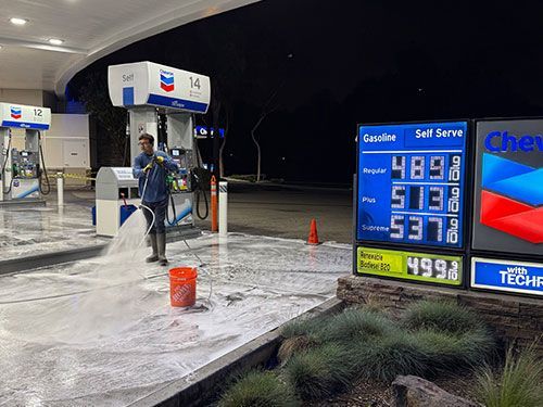 Pressure Washing a gas station