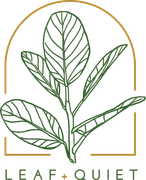 A drawing of a plant with leaves and the words leaf + quiet.