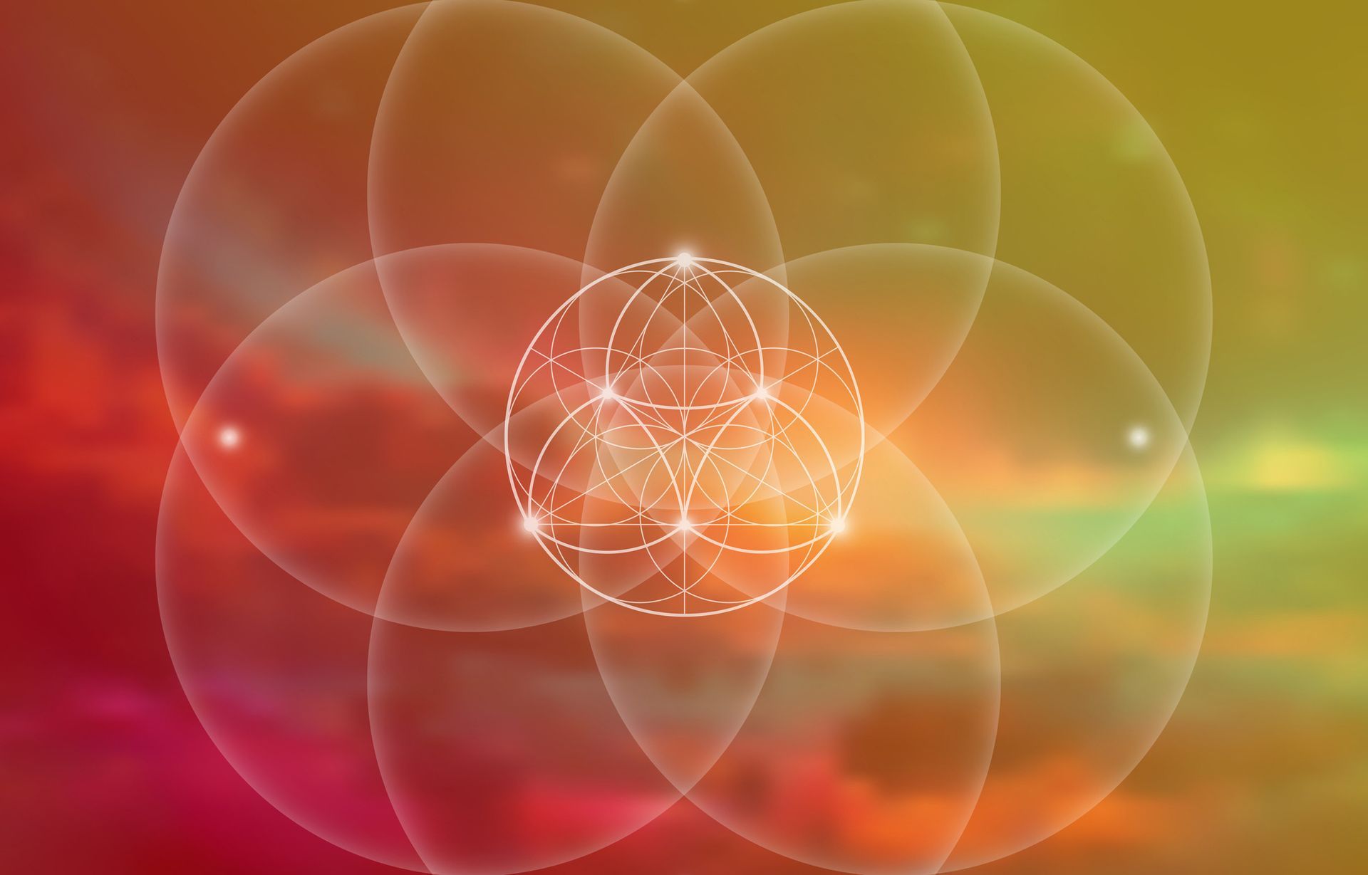 White geometric design over a blurred, multicolored background.