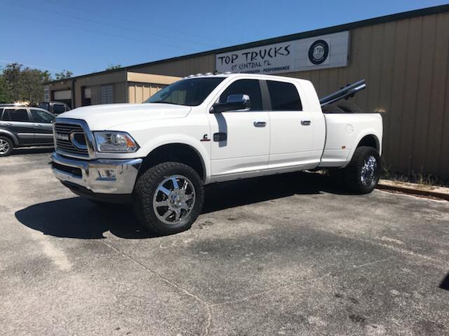 Import — White Dodge on Parking Lot in Longwood, FL
