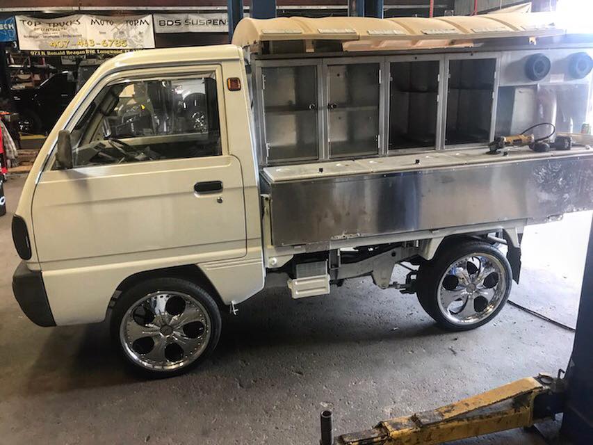 Vehicle Accessories — White Import Truck in Longwood, FL