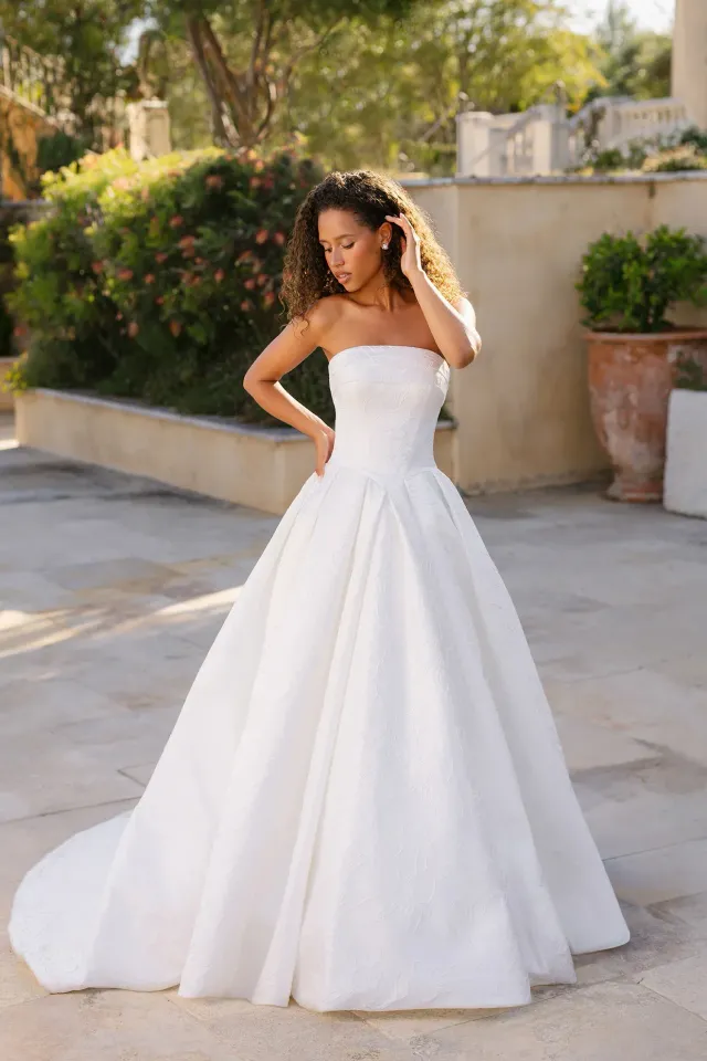 allure wedding dresses Bridals 9954 Gown The M595 is a beautifully simple modest with fluttering chiffon sleeves Designer Wedding Dresses & Bridal