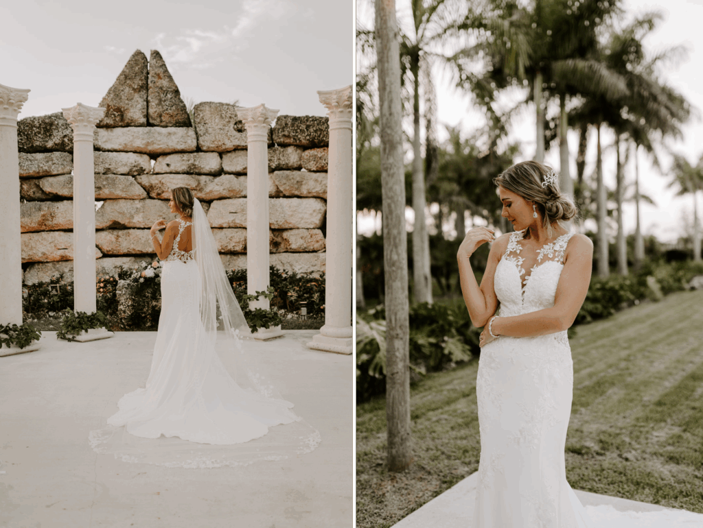 Bride in wedding dress, posing outdoors near columns and palm trees.