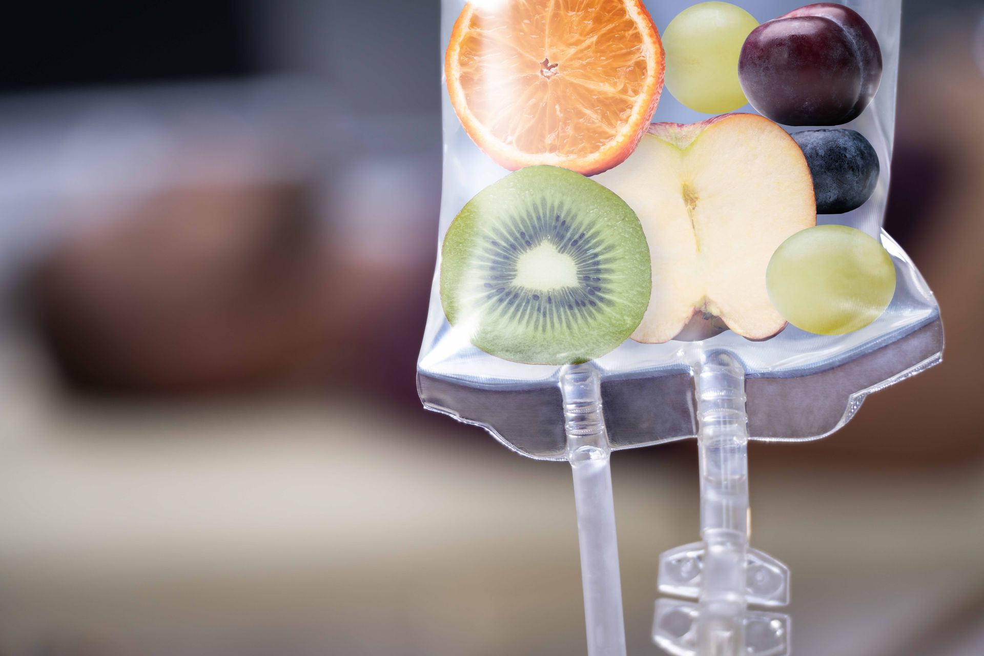 a bag of fruit including kiwi apple and grapes