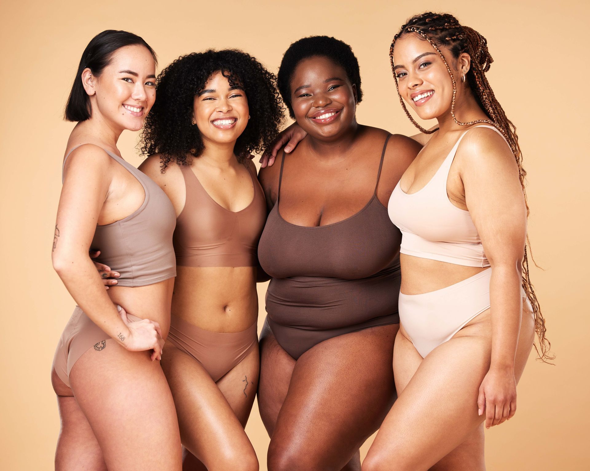 four women are posing for a picture