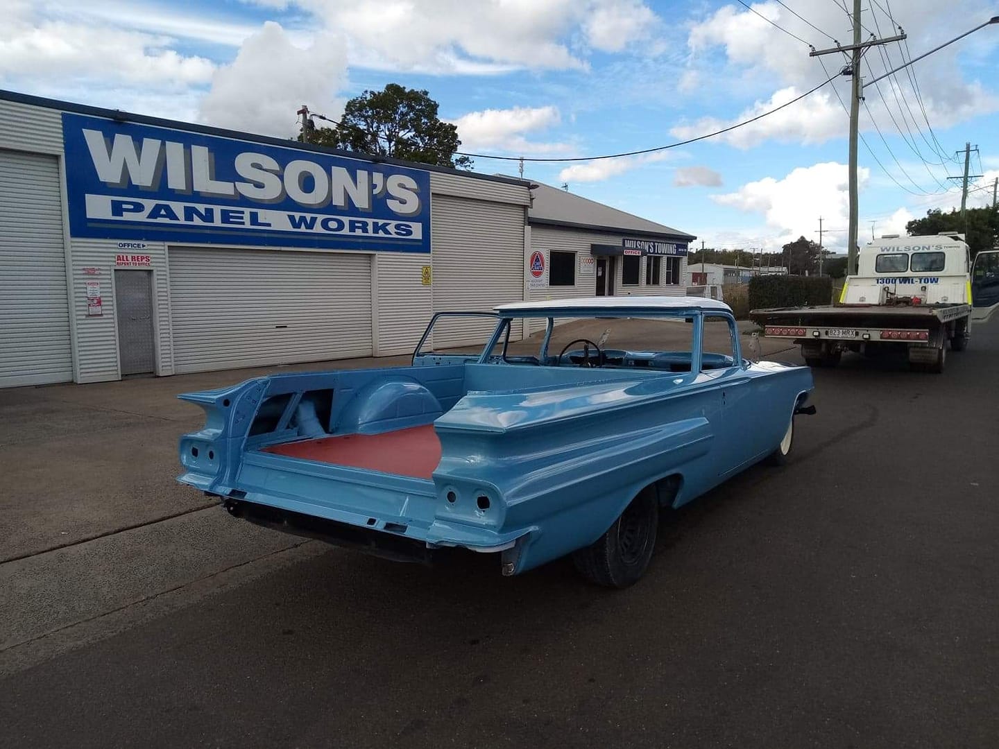 Tow Truck Loaded By Car— Smash Repairs & Spray Painting in Toowoomba, QLD