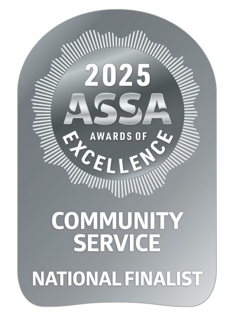 Silver ASSA Awards of Excellence badge: 2025 seal, "Community Service National Finalist" text.