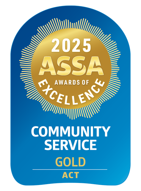Gold award, 2025 ASSA Awards of Excellence. Blue and gold seal for Community Service in ACT.
