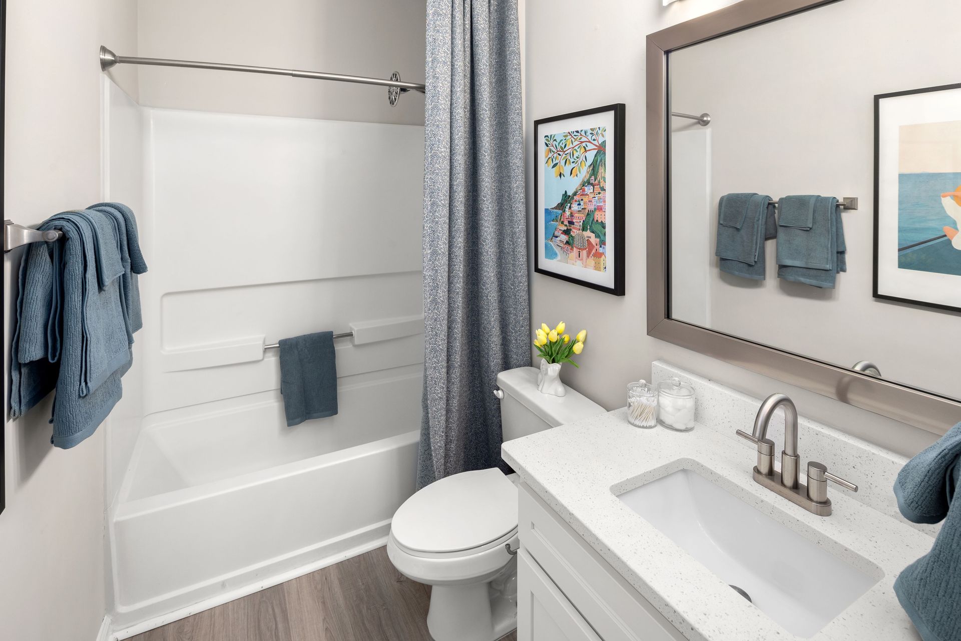 a bathroom with a sink toilet and bathtub