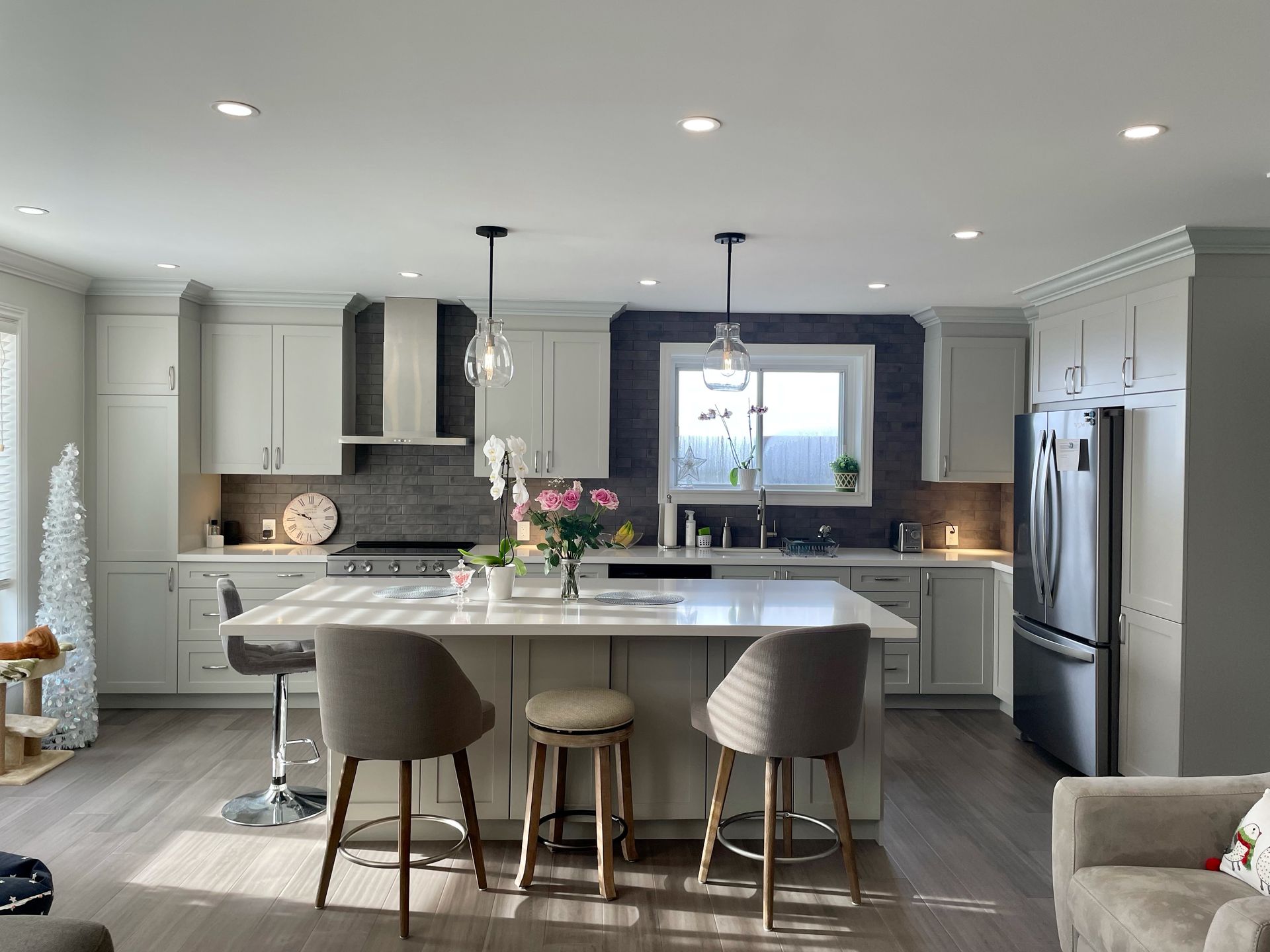 A kitchen with a large island in the middle of the room.