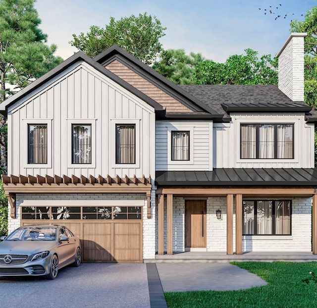 Modern white house with brown trim, garage, and a car in the driveway. Green trees in the background.