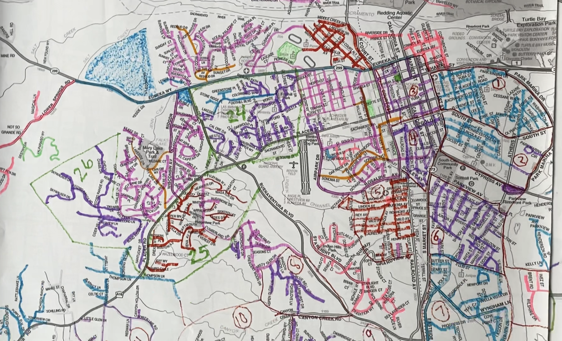 A map of a city with a lot of drawings on it