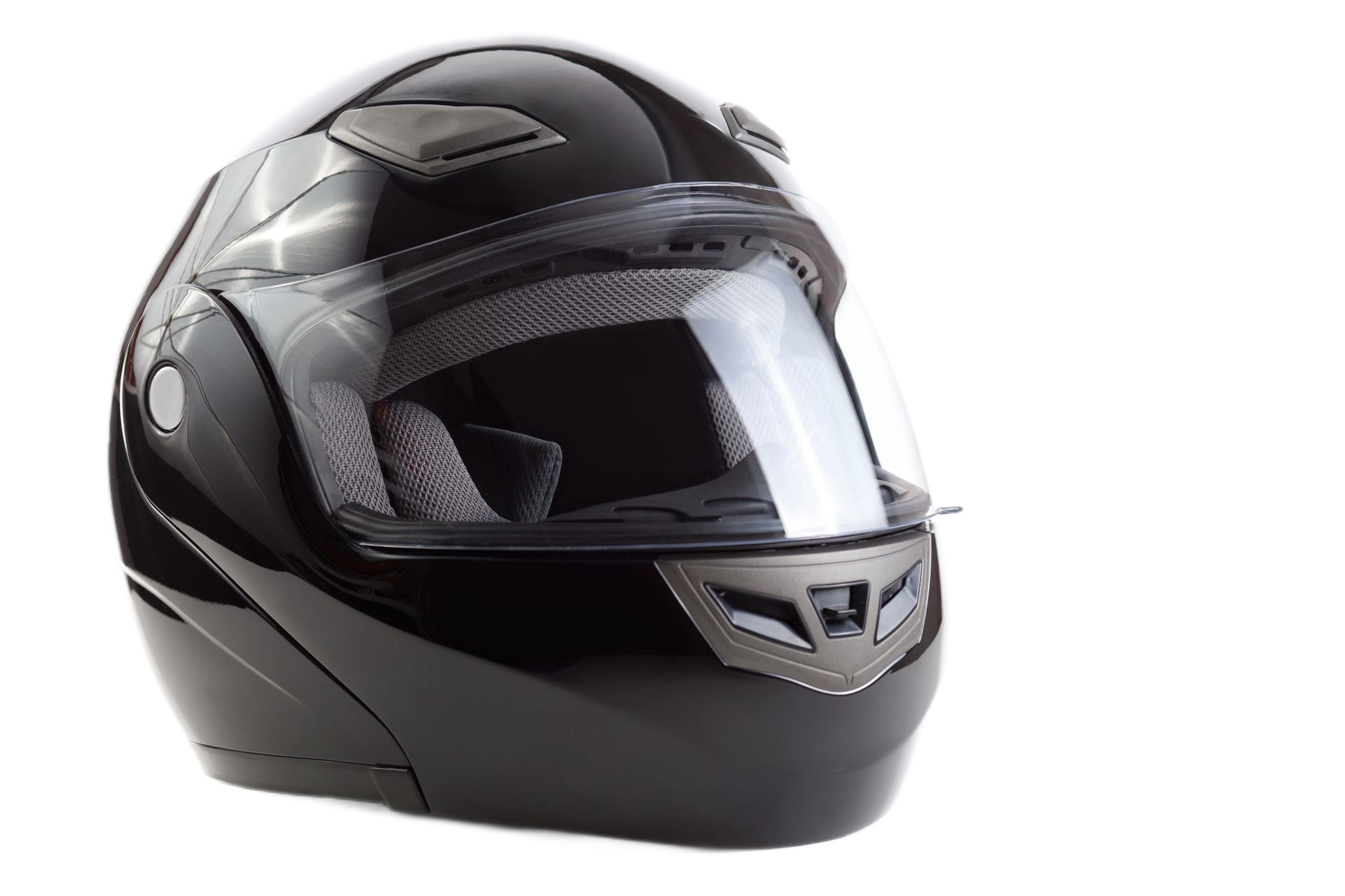 Casco integrale da moto nero con visiera trasparente su sfondo bianco.