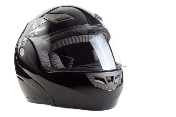 Casco integrale da moto nero con visiera trasparente su sfondo bianco.