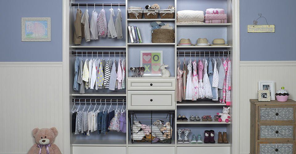 Custom Kids Closet with a Antique White Finish