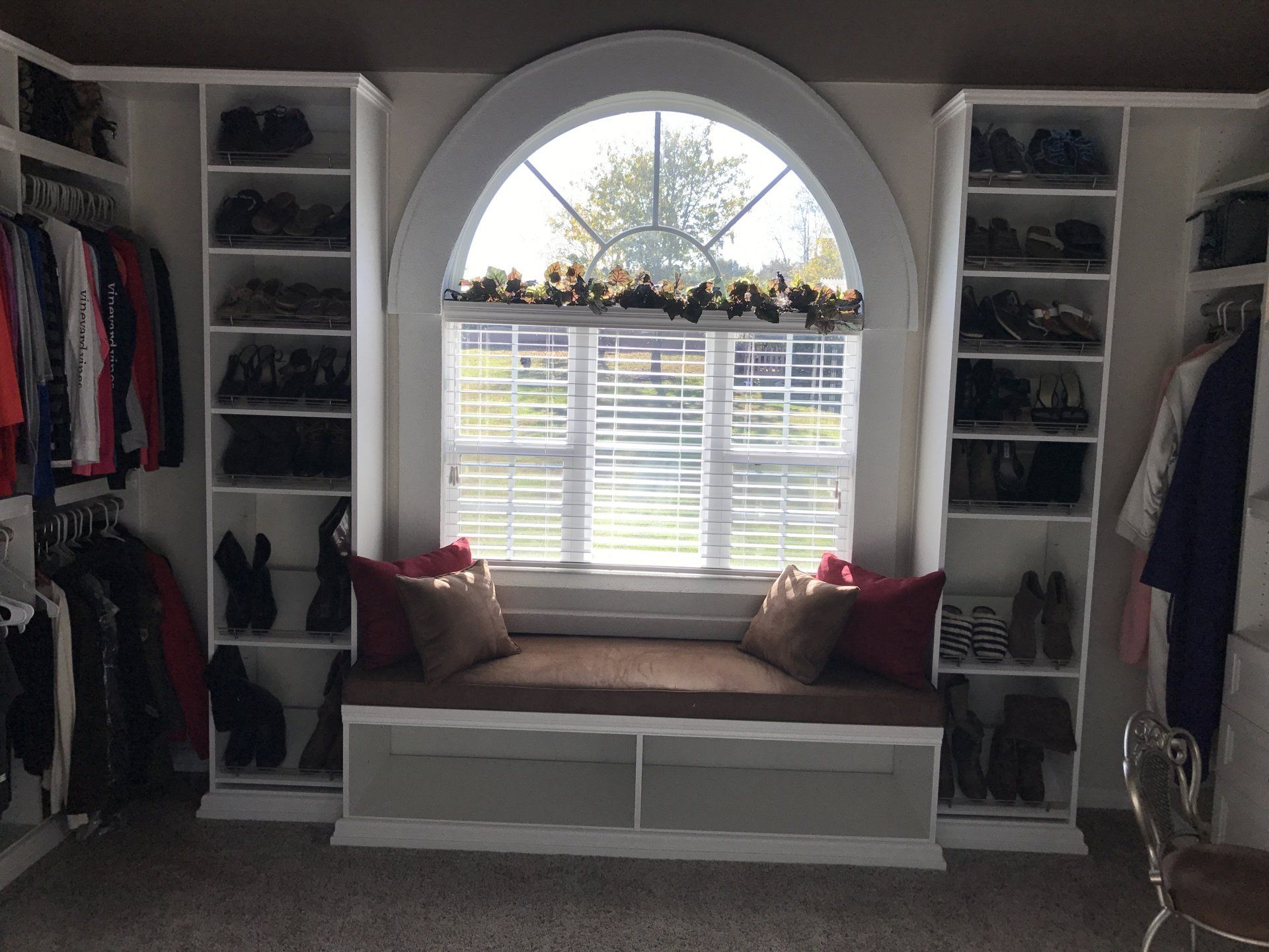 Custom Walk In Closet with a White Finish
