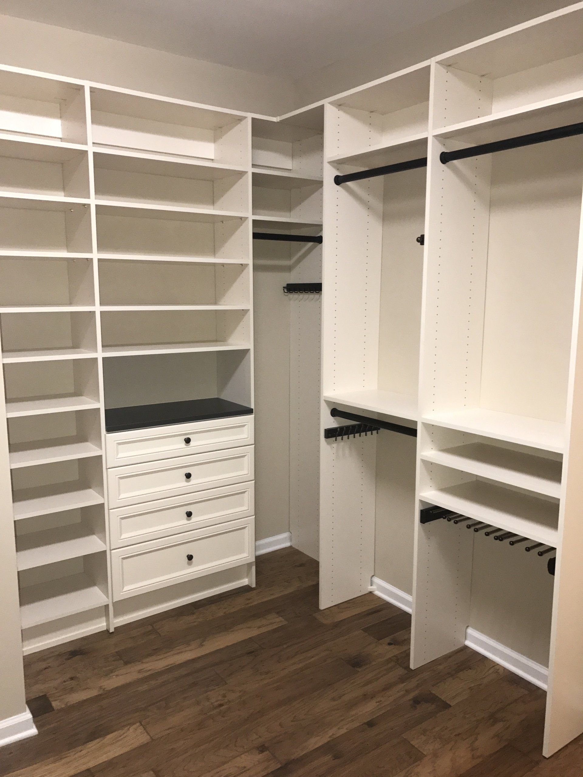 Custom Walk In Closet with a White Finish