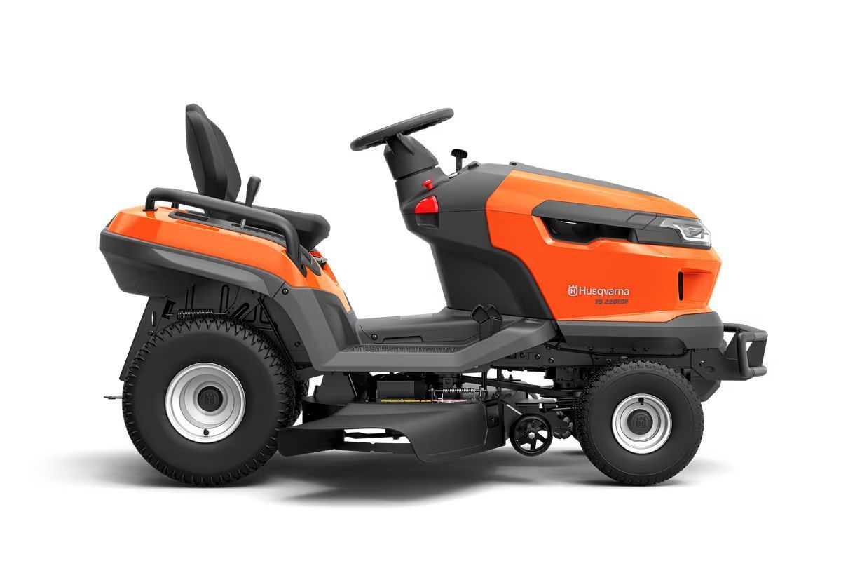 Orange and black riding lawn mower.