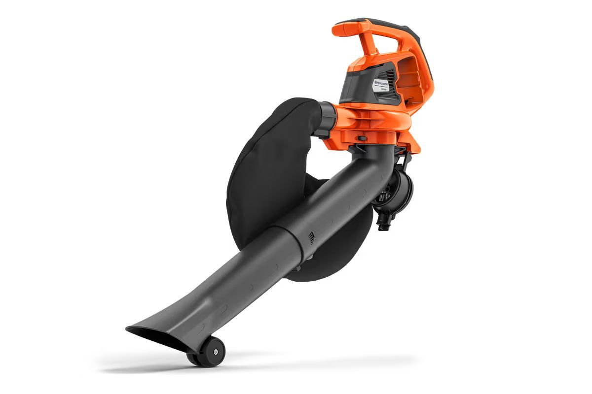 Black and orange leaf blower angled against a white background.