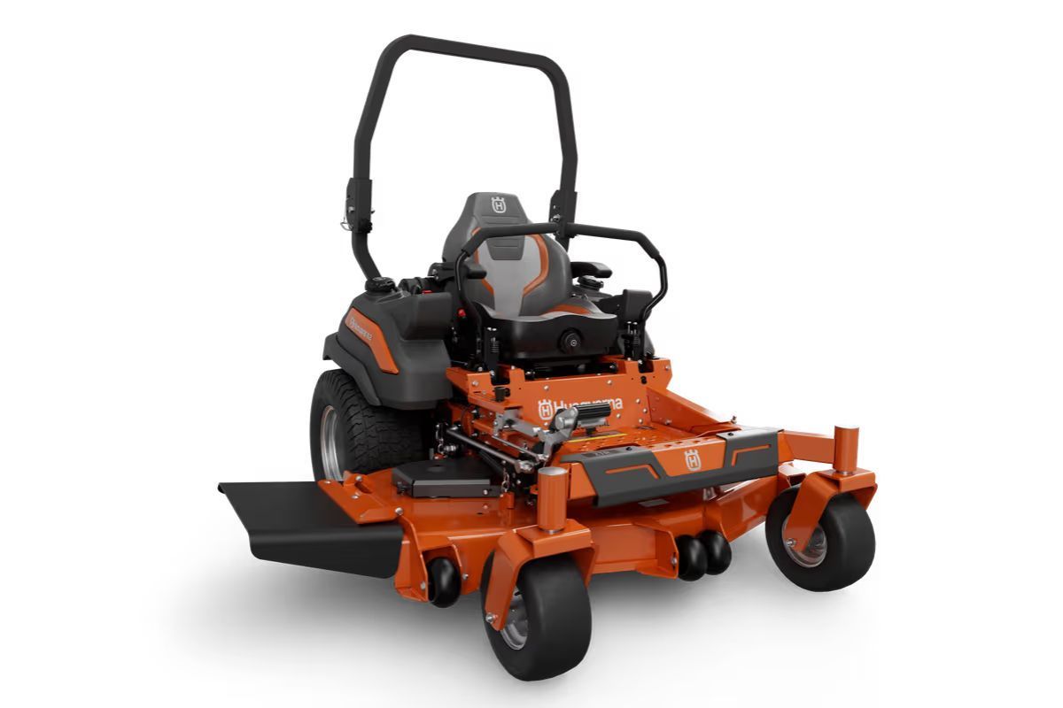Orange Husqvarna zero-turn lawn mower with black accents, angled on a white background.