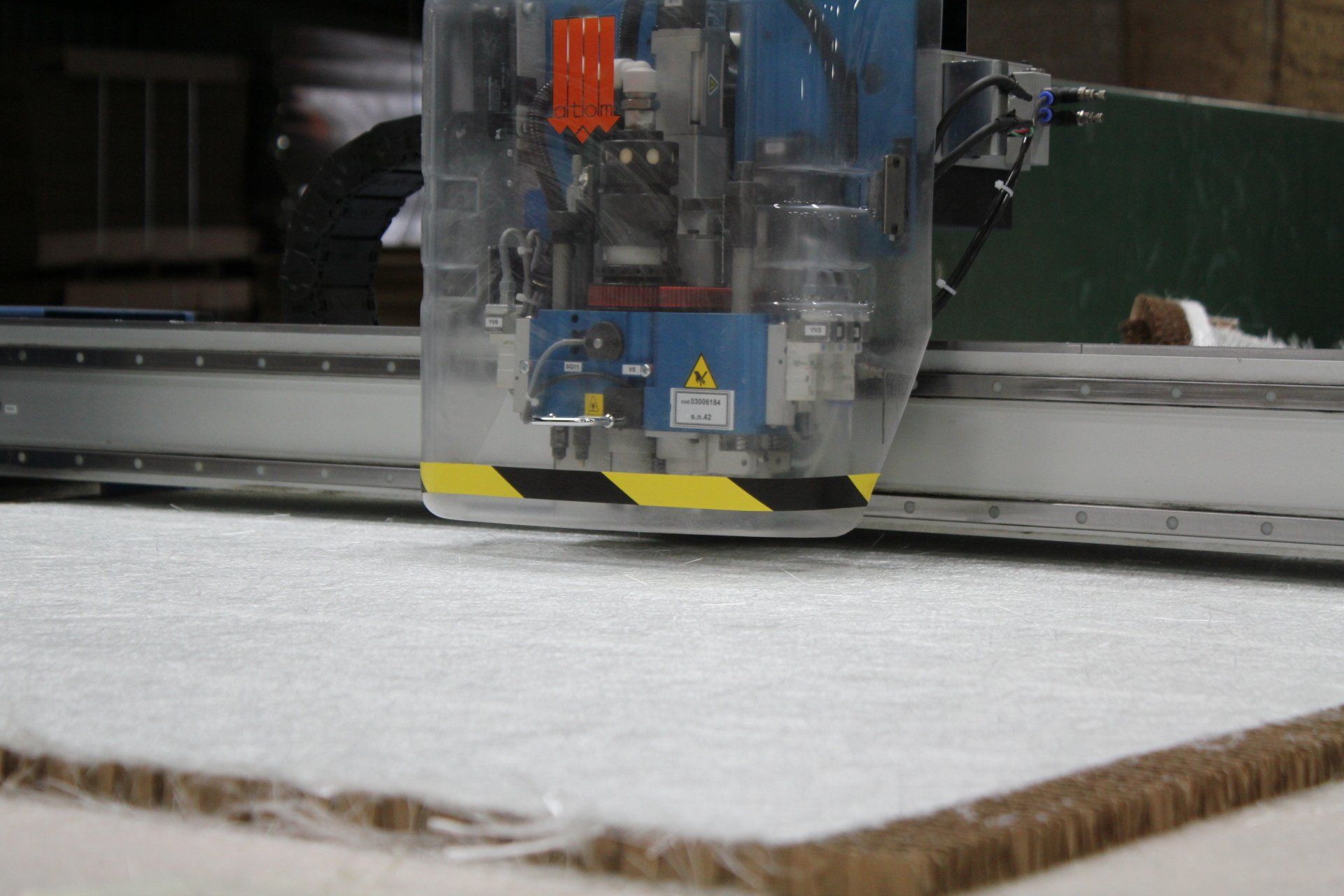 A machine working with material.