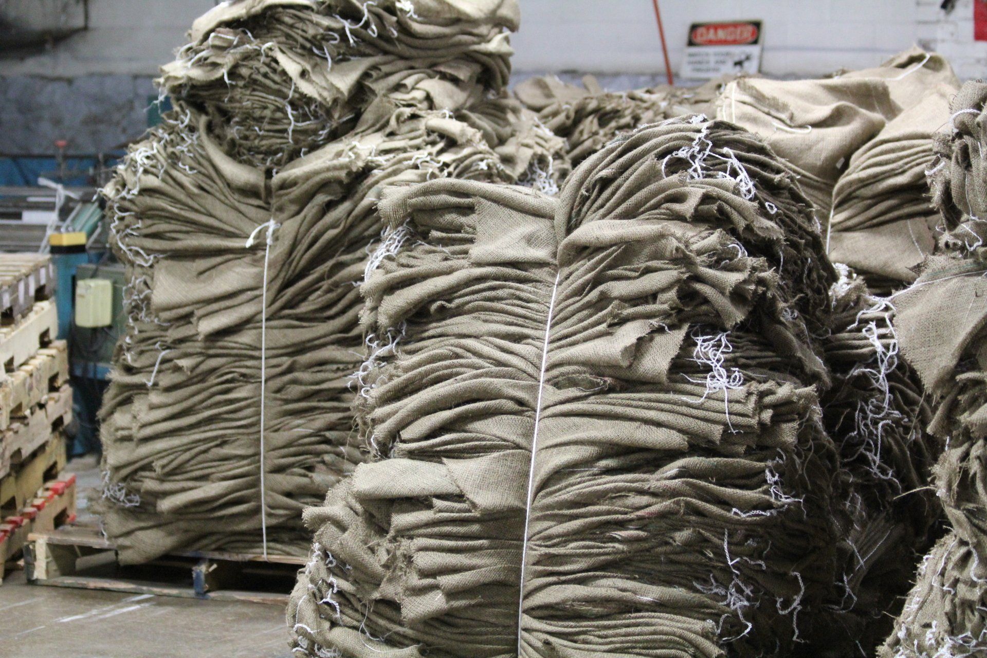 Piles of burlap material.