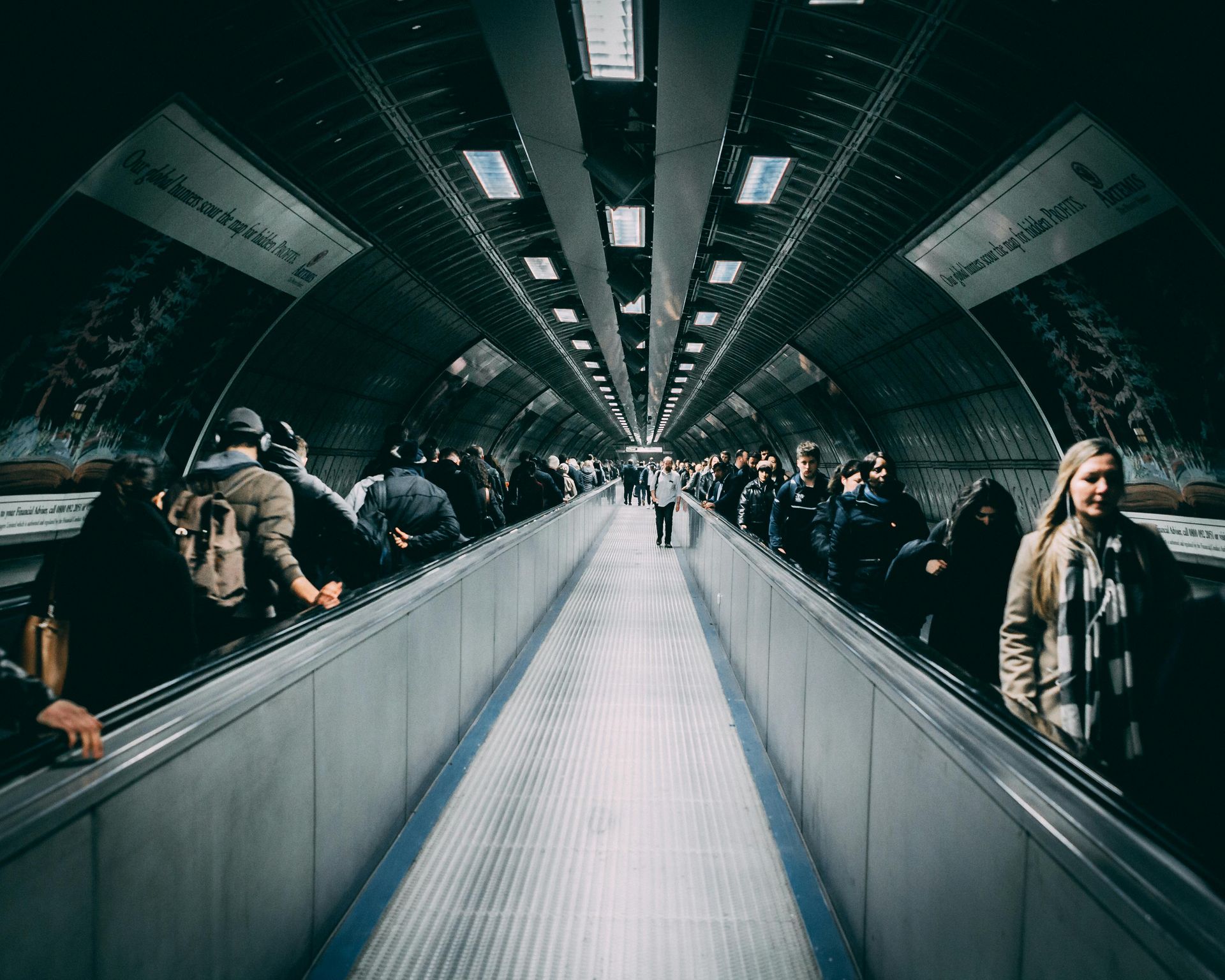 Busy Londoners commuting in the tube 