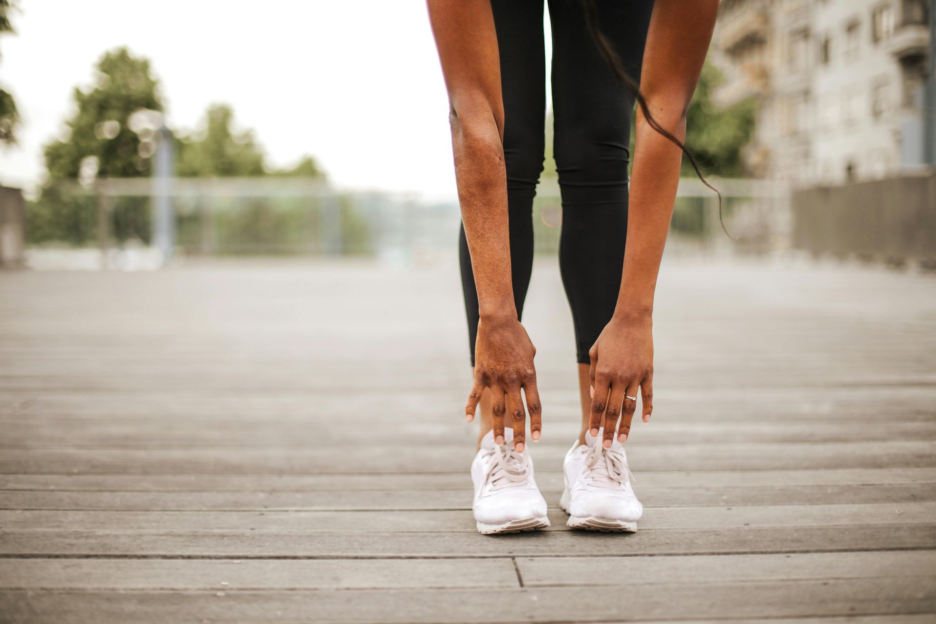 A girl stretching for her toes