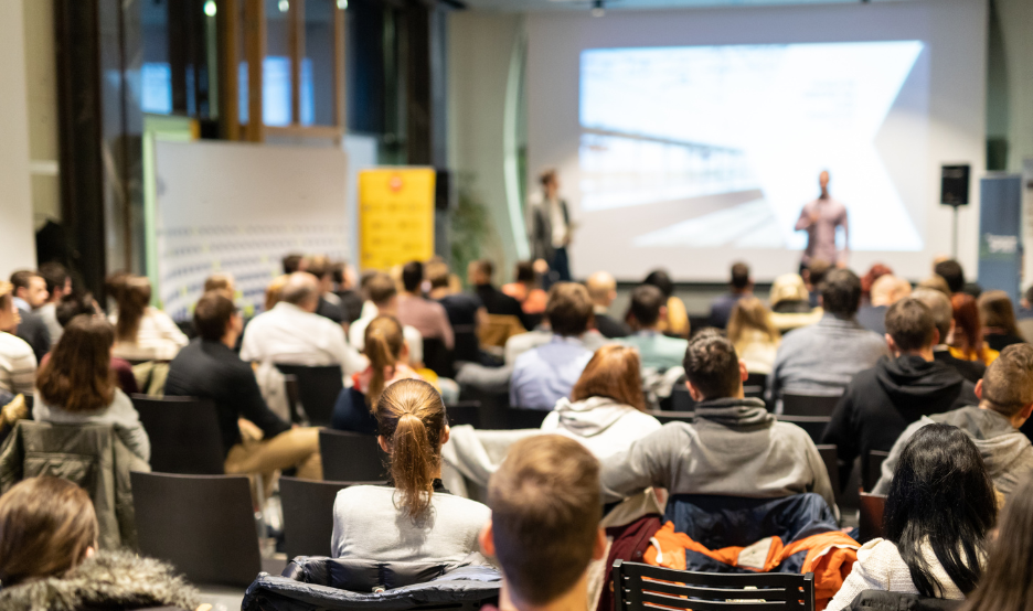 people listening to presentation