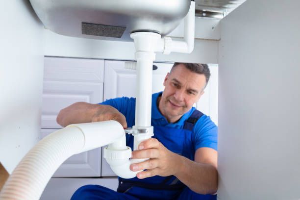 Plumber repairing a pipe providing 24 Hour Plumbing Services in Milwaukee WI